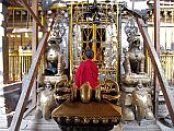 Kathmandu Patan Golden Temple 23 Vajra With Elephants Holding Snow Lions With Main Shakyamuni Shrine Behind 